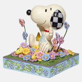 Peanuts by Jim Shore - Snoopy in bed of Flowers Figurine 12 cm