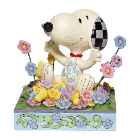 Peanuts by Jim Shore - Snoopy in bed of Flowers Figurine 12 cm